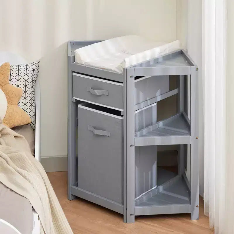 Table à langer d'angle compacte avec tiroir de rangement, panier à linge et matelas imperméable, meuble à langer moderne en bois pour chambre d'enfant, gris